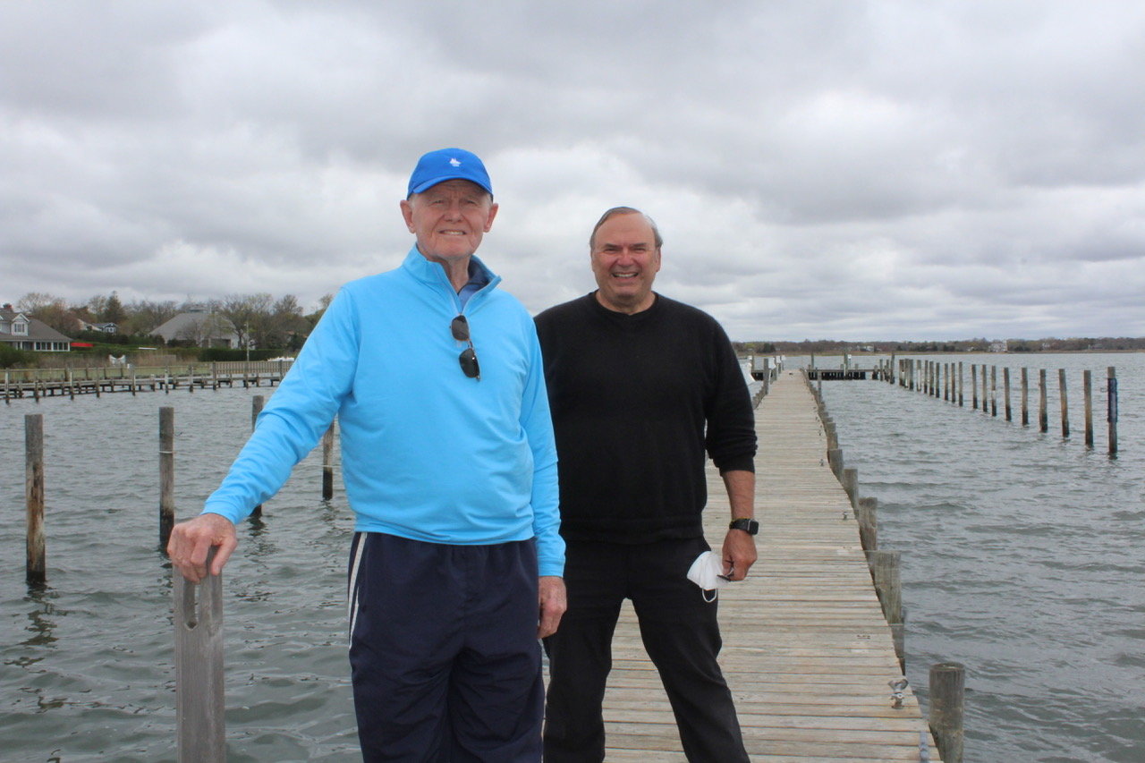 Mayor Ray Fell and village clerk John Kocay on the stick dock, which is planned for replacement via a newly approved federal $2.8 million Community Project Funding grant from the Omnibus Appropriations bill.